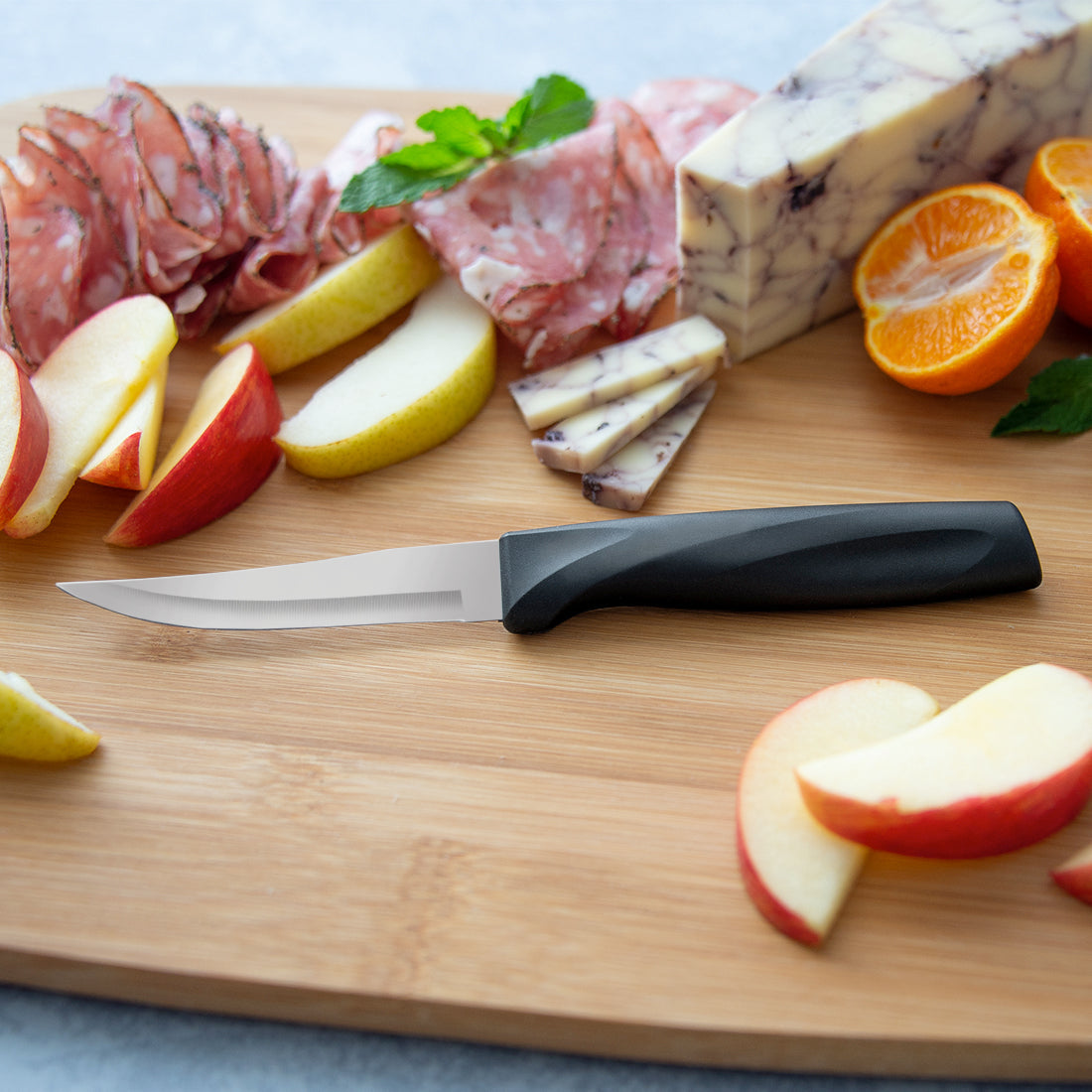 Black Knife On The Chopping Board